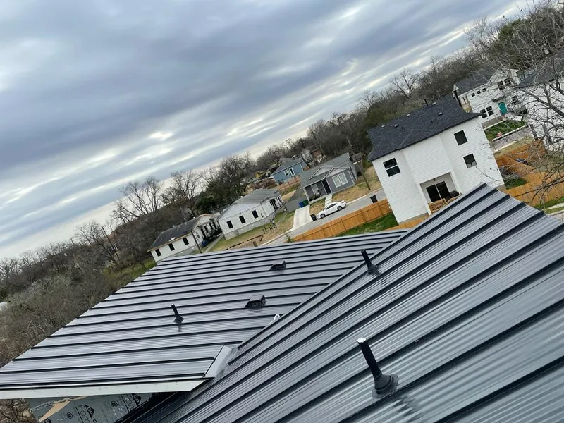 Standing seam metal roof panels with vents for Skylight Repair in Highlands Ranch